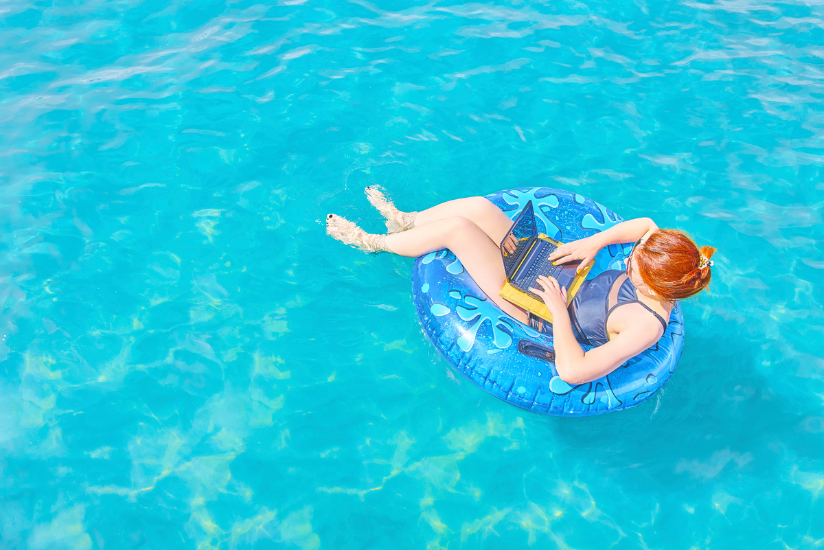 Beautiful young woman in the sea.